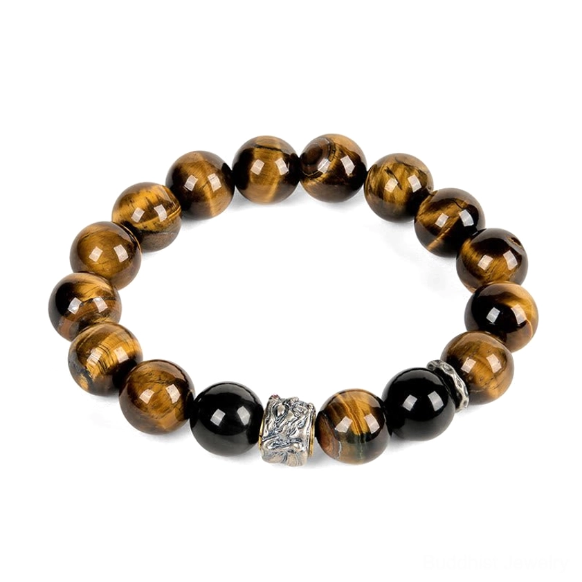 Stretch meditation bracelet with tiger eye and black obsidian stones featuring silver Buddha head charm flat lay