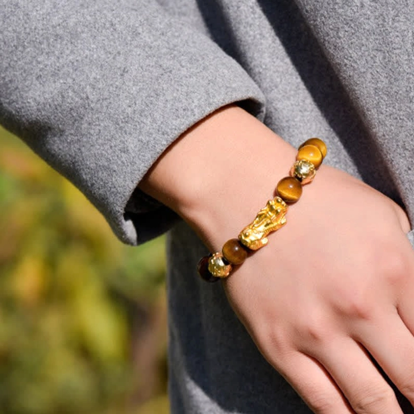 Tiger Eye Pixiu bracelet lifestyle shot, worn as daily spiritual accessory
