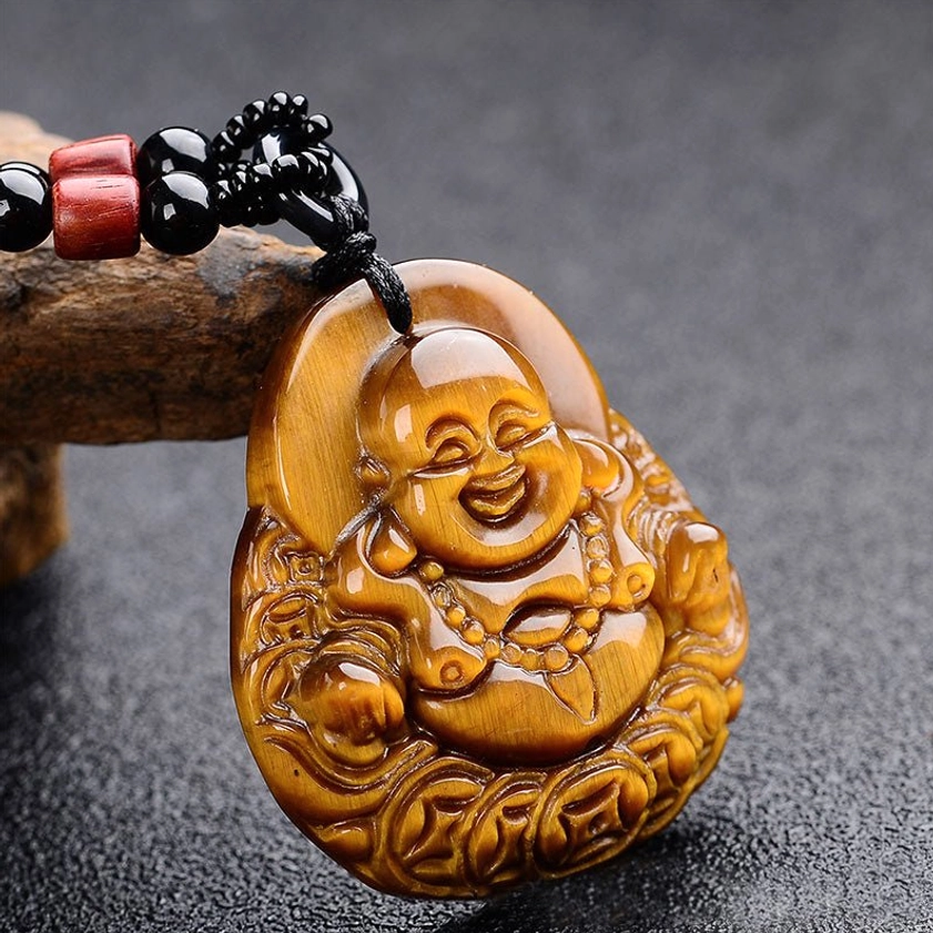 Tiger's eye laughing Buddha necklace front view with intricate carved Maitreya pendant and black beaded cord