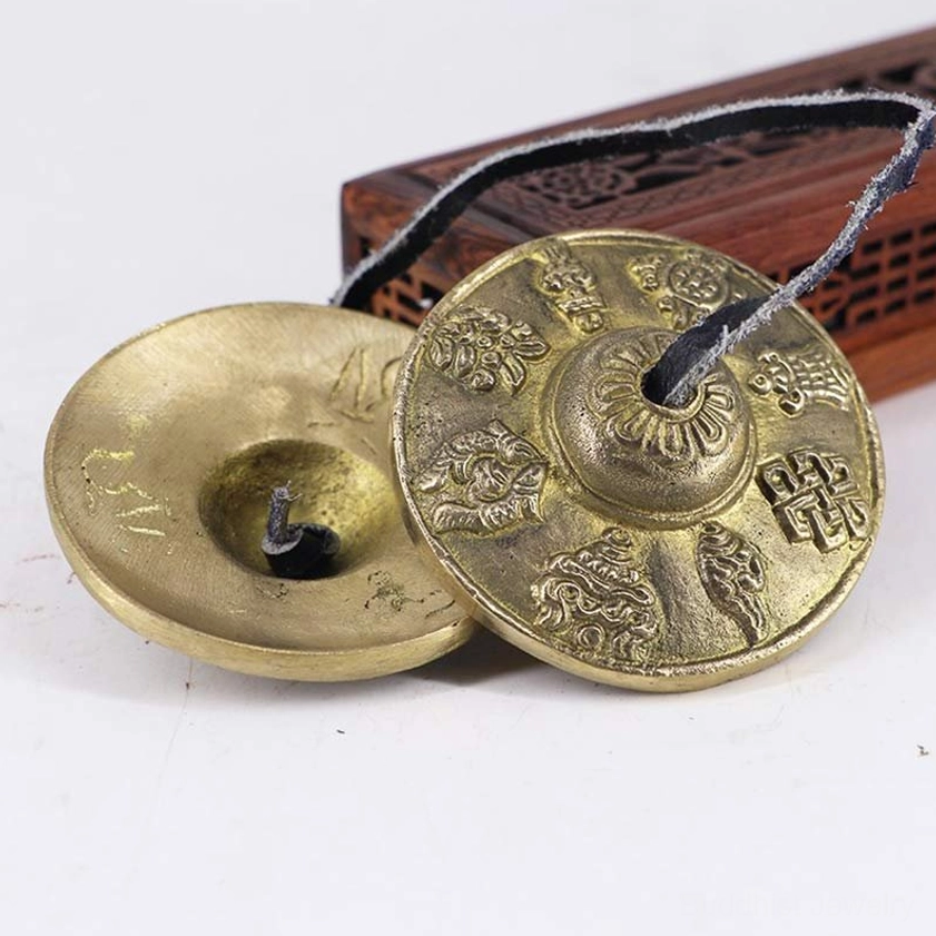 Buddhist tingsha sound healing cymbals with dragon symbol and protective engraving