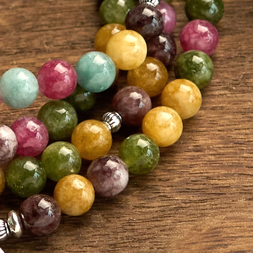 Tourmaline natural stone beads in varied colors showing the multifaceted healing properties of this crystal