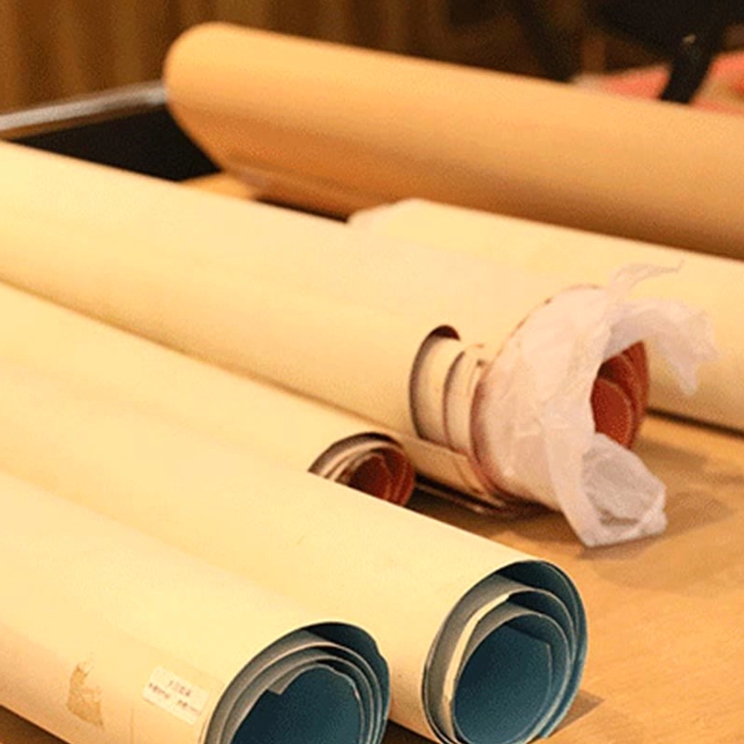Traditional Buddhist thangka scroll painting with intricate gold details and spiritual iconography - meditation art
