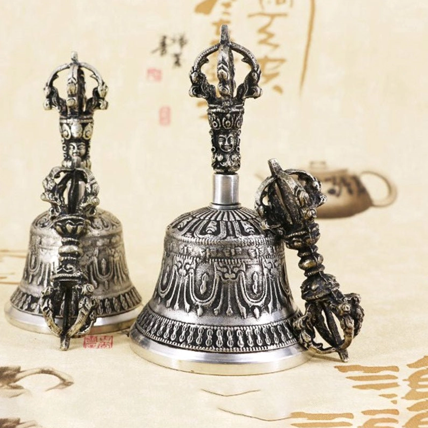 Buddhist bell and dorje set showing traditional carved patterns and spiritual symbols handmade quality