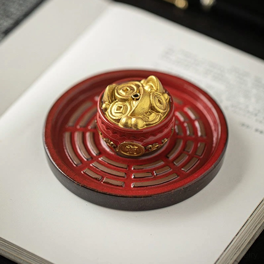 Treasure bowl ceramic incense holder with gold ingot decorations symbolizing prosperity and good fortune