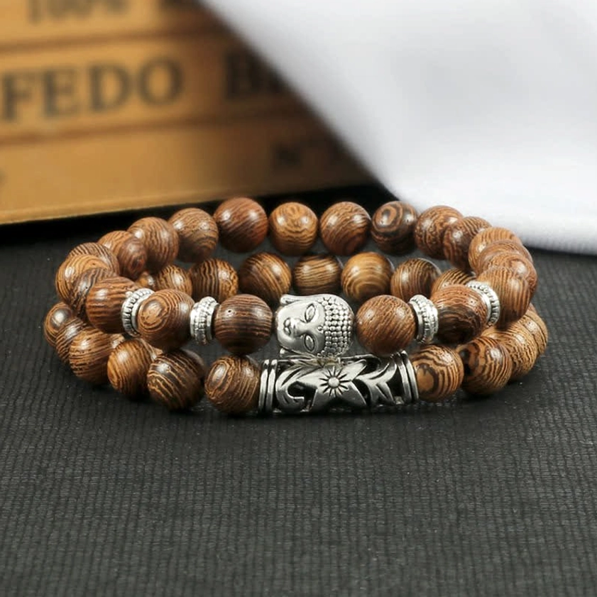 Turquoise stone Buddhist protection bracelet featuring natural gemstone beads and silver Buddha meditation charm