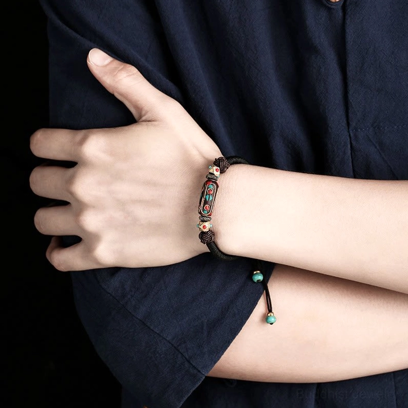 Protective Buddhist mantra bracelet with turquoise beads and Om Mani Padme Hum enamel charm for spiritual practice and inner peace