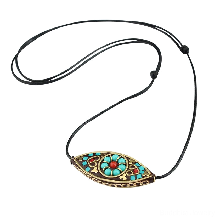 Handmade turquoise Buddhist pendant necklace with wax rope attachment and knot detail showing adjustability