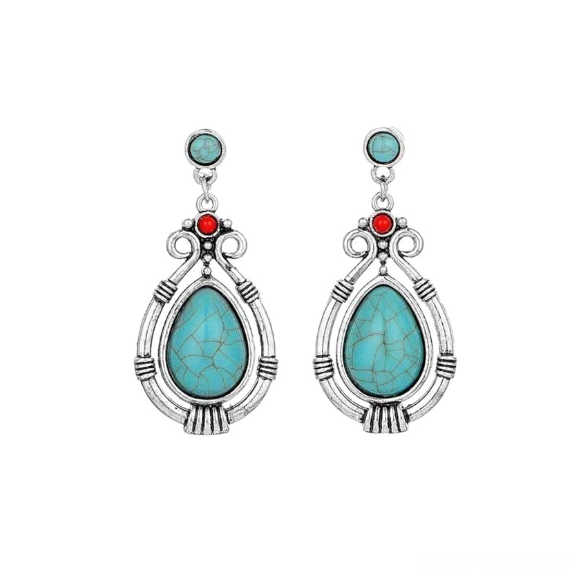 Turquoise teardrop Buddhist dangle earrings close-up detail showing natural stone patterns and silver craftsmanship