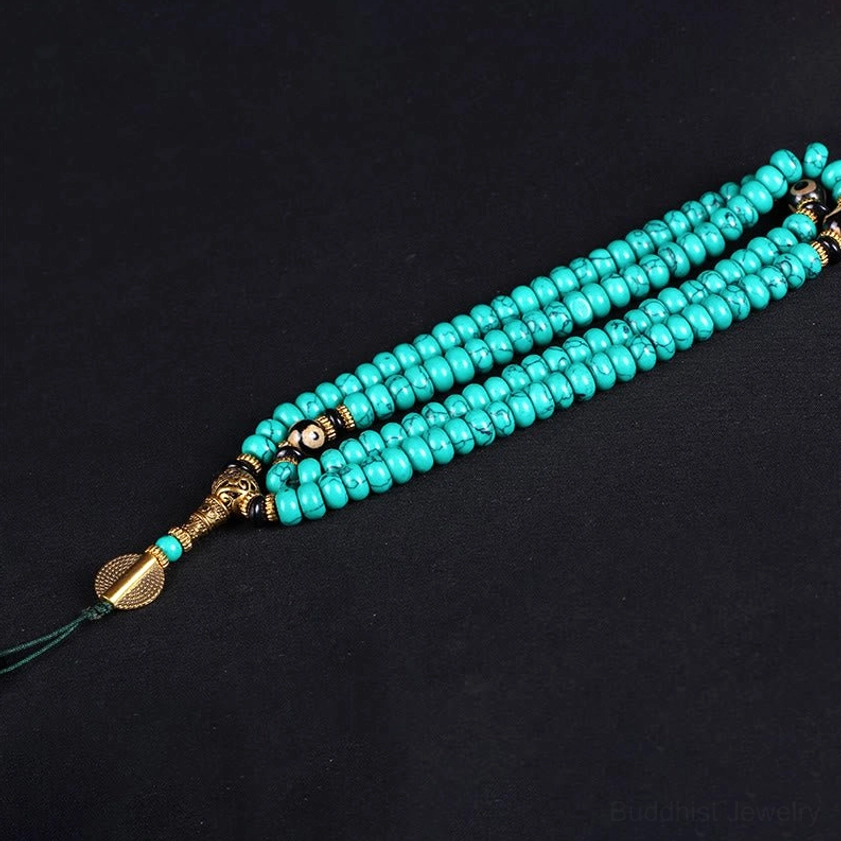 Single strand 108 bead turquoise Buddhist prayer mala with gold end fittings