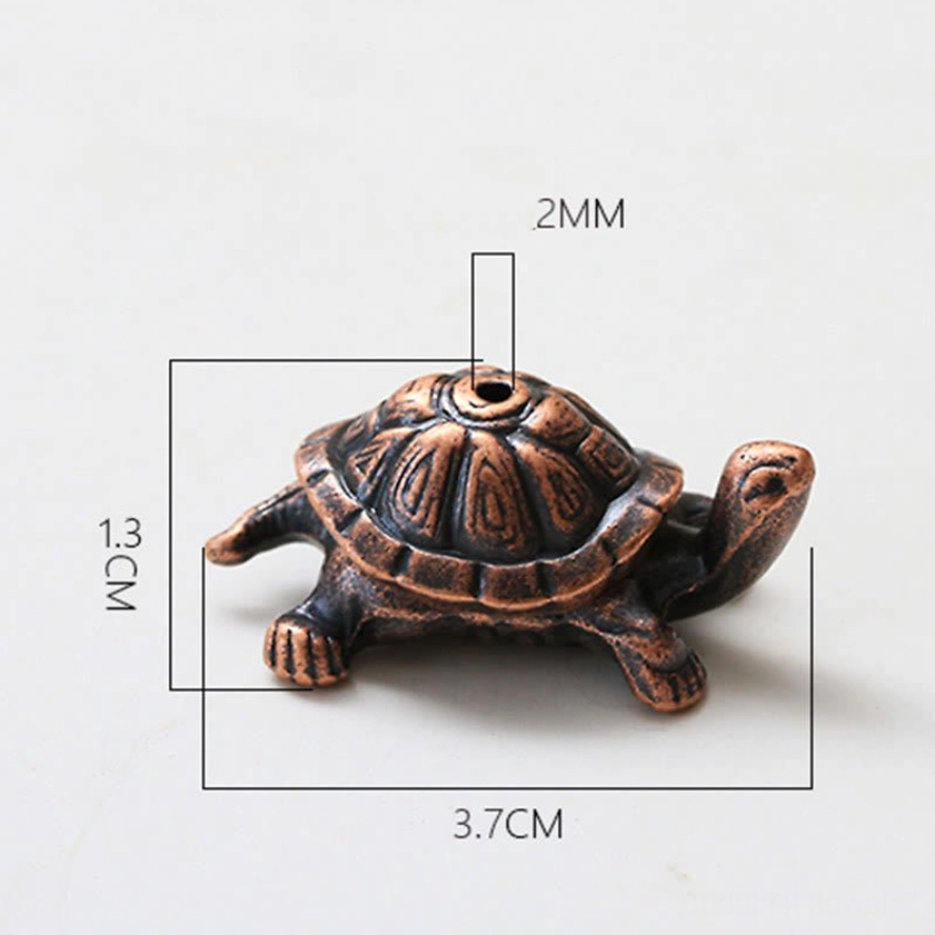 Copper turtle incense holder side view with size dimension markers 3.7cm length and 1.3cm height on white background