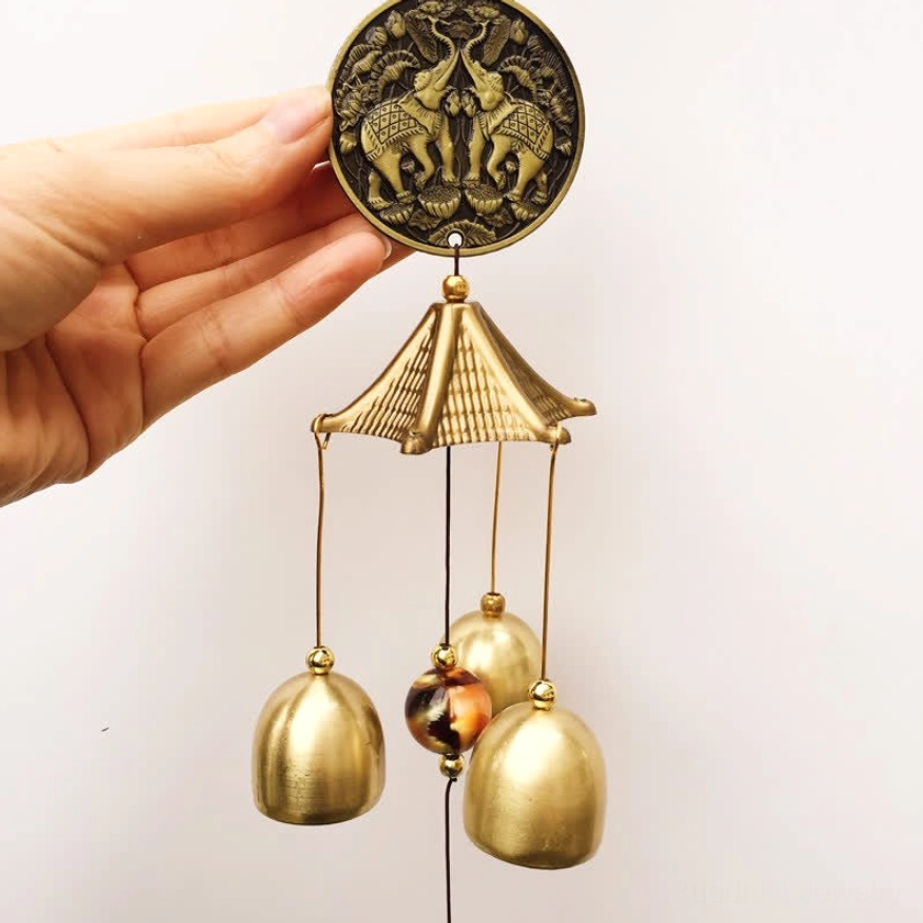 Twin elephant carved bronze coin wind chime with three brass bells and amber bead for luck and wisdom