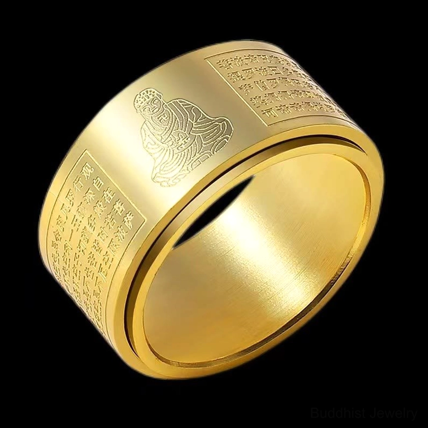 Two-tone zodiac buddha rotating ring showing silver and gold contrast