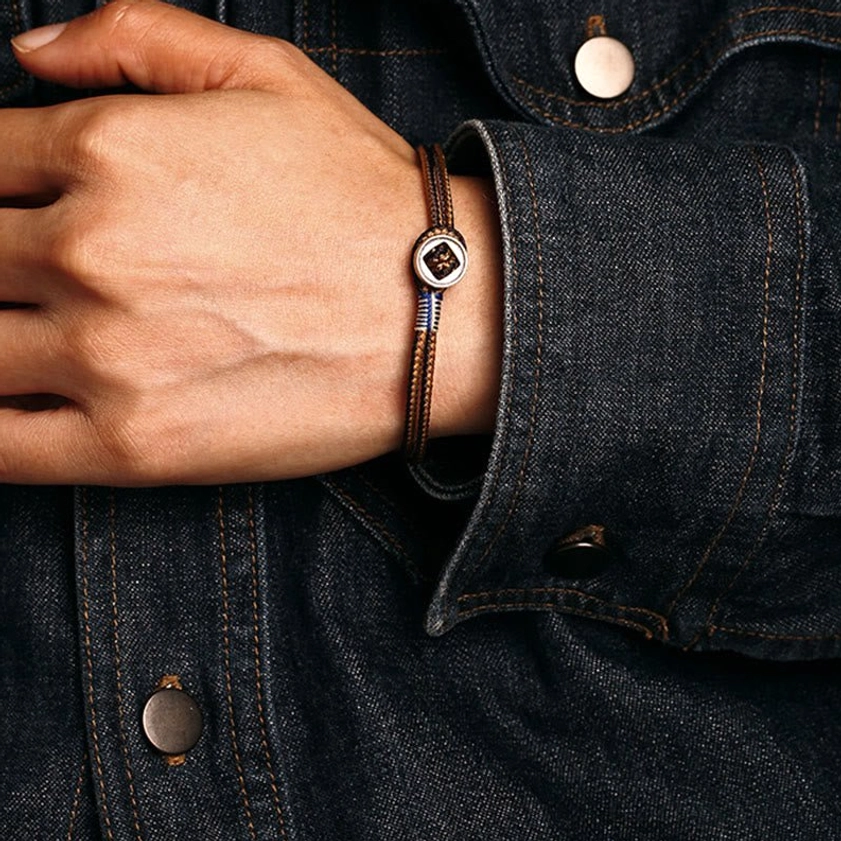 Unisex sterling silver woven bracelet inspired by Buddhist tradition, crafted for inner balance and spiritual wellness