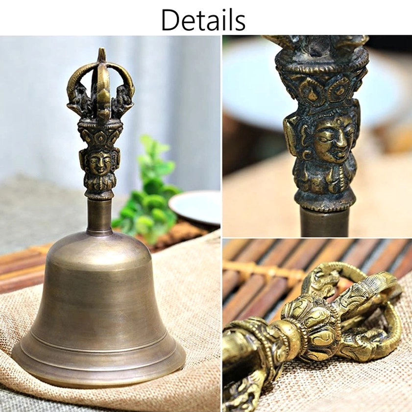 Frontal close-up of handcrafted vajra dorje and meditation bell set on light fabric background
