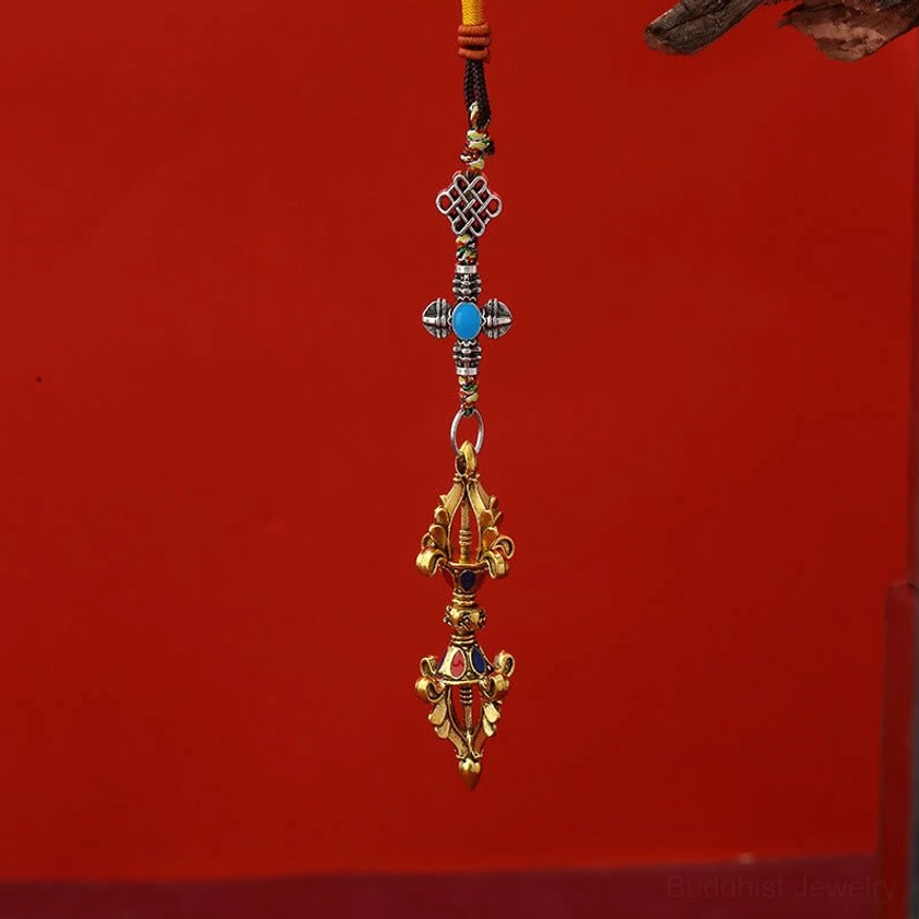 Antique Gold Vajra Enlightenment Keychain with Blue Inlay and Braided Black-Yellow Cord