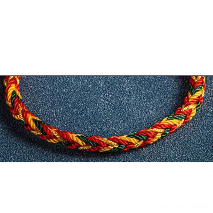 Handwoven Buddhist protection bracelet with vibrant multicolored threads and authentic sterling silver charm for spiritual energy and daily wear
