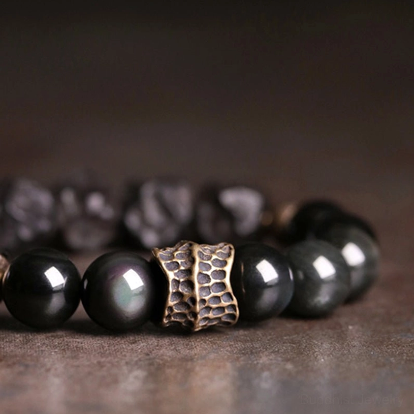 Couple bracelet detail - embossed vintage bronze metal spacer bead with natural obsidian and ebony wood