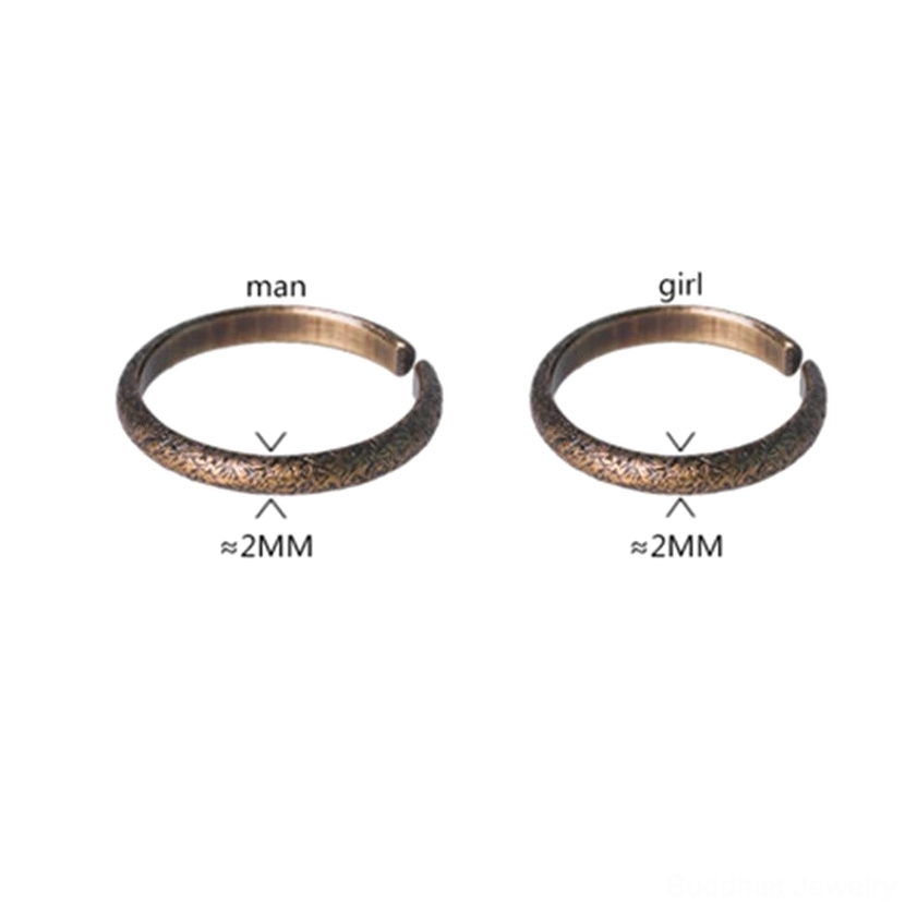 Vintage copper Buddhist couple rings set featuring adjustable sizing for women and men