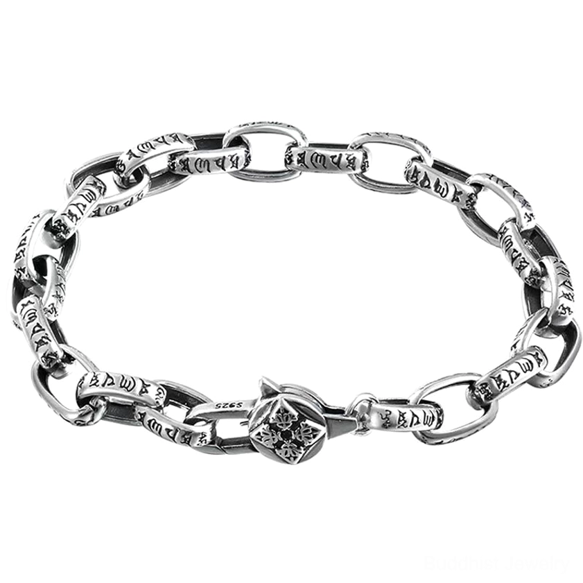 Vintage-style copper mantra bracelet with central Double Dorje symbol and engraved chain links on white background