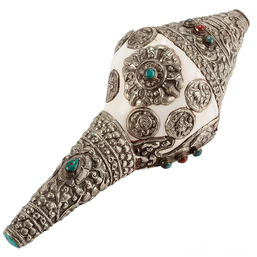 Vintage style shankha conch shell decoration with intricate filigree silver work and natural gemstone placement