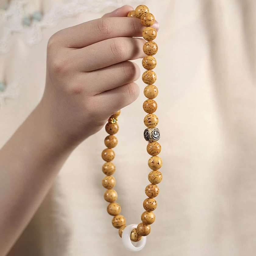 Bodhi seed wealth attraction bracelet showing authentic handmade craftsmanship and natural variations