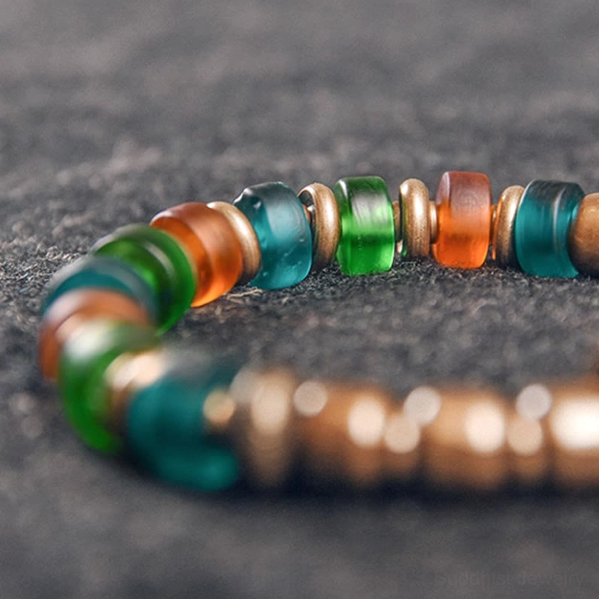 Wealth and prosperity copper bracelet with colorful glass beads spiritual meaning care instructions guide