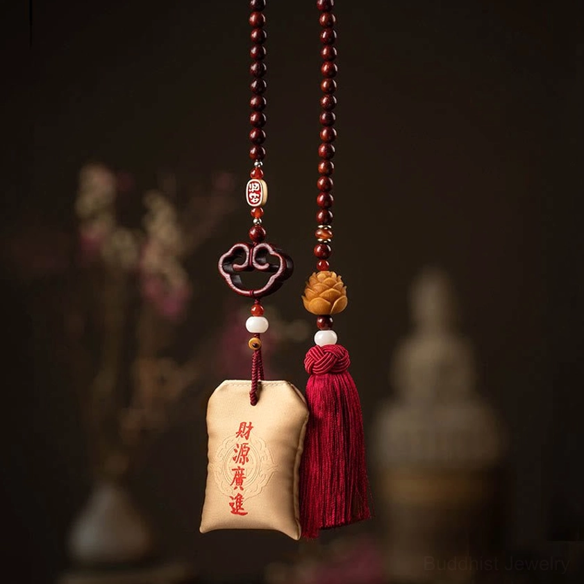 Wealth and prosperity embroidered red sandalwood sachet with cinnabar filling, wooden lotus charm, and protective red tassel