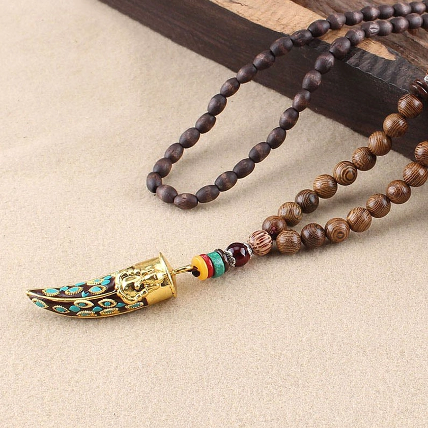 Wenge wood golden horn pendant necklace with sacred markings and metal detail