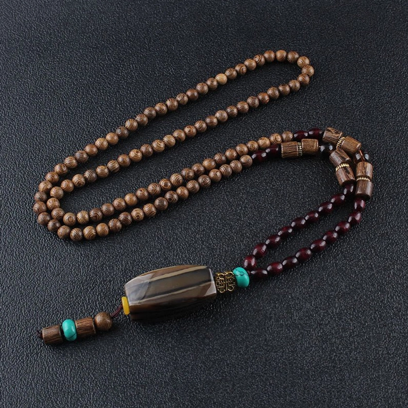 Wenge wood Buddhist necklace with random wooden bead design and traditional Bodhi seed for spiritual connection