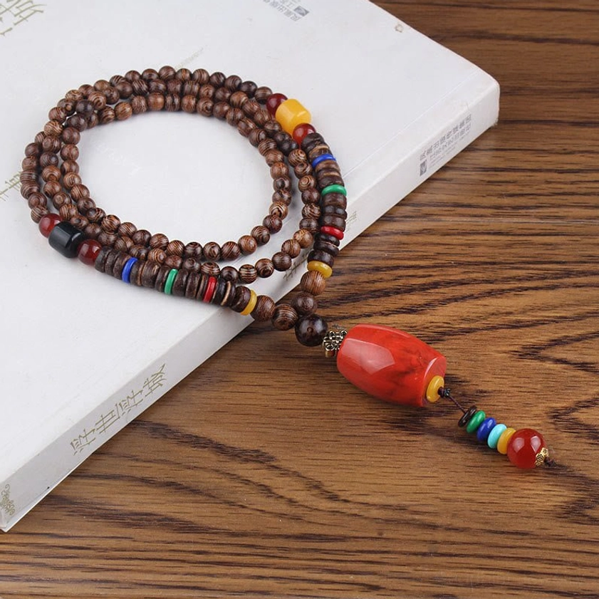Wenge wood Buddhist necklace with red resin cylinder beads and Bodhi seed for spiritual grounding