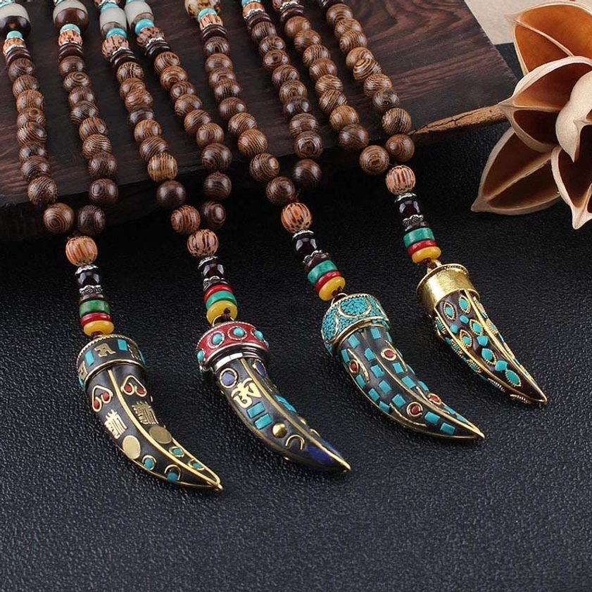 Wenge wood om mani padme hum buddhist necklace with sacred mantra pendant flat lay
