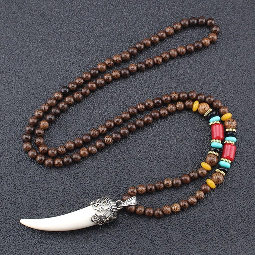 White wenge wood turquoise horn pendant necklace with silver carved cap and colorful bead accents flat lay