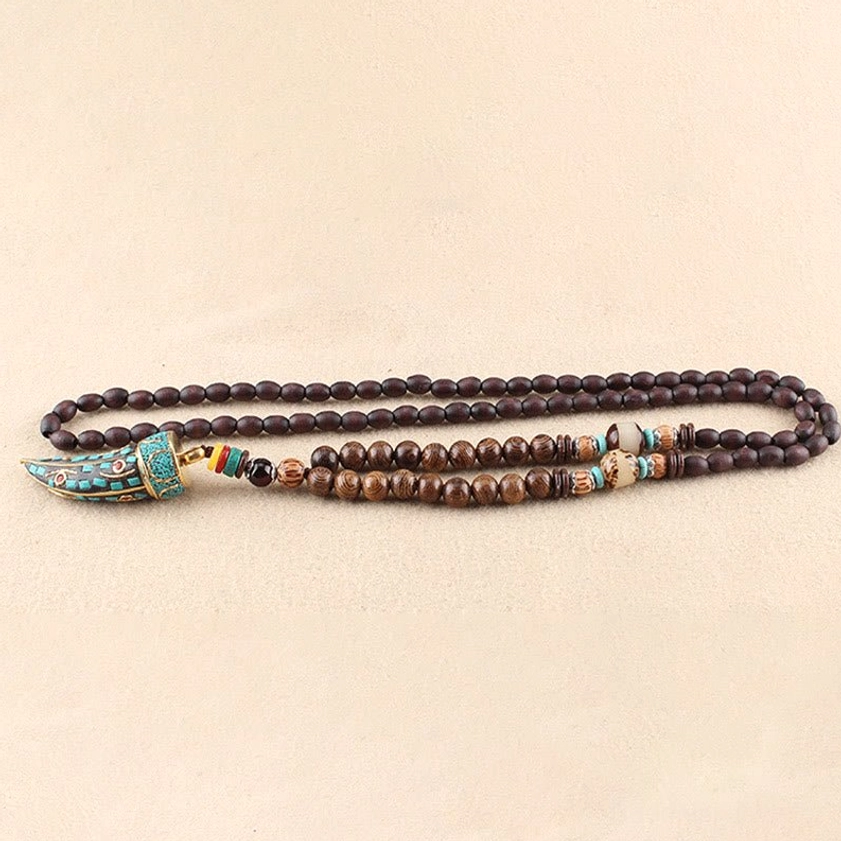 Wenge wood necklace pendant with turquoise accents and sacred engravings