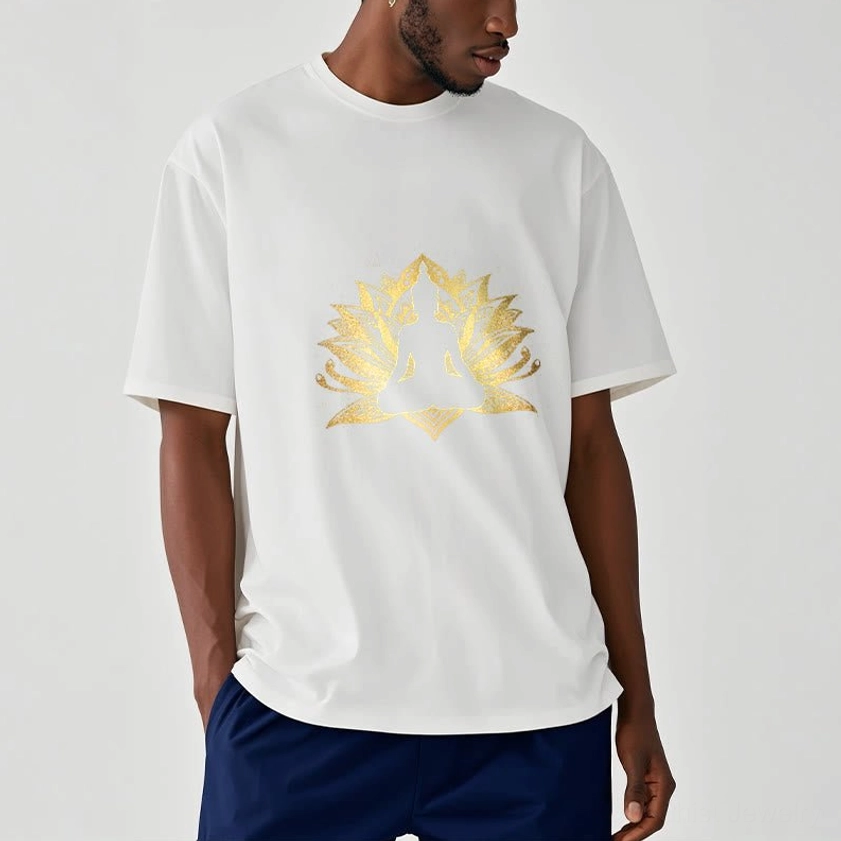 Male model wearing white lotus Buddha graphic t-shirt with gold meditation print, full front view with dark trousers