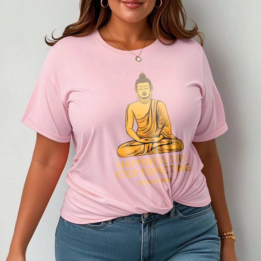 Close-up detail of white Buddhist mindfulness t-shirt showing golden Buddha silhouette and typography precision