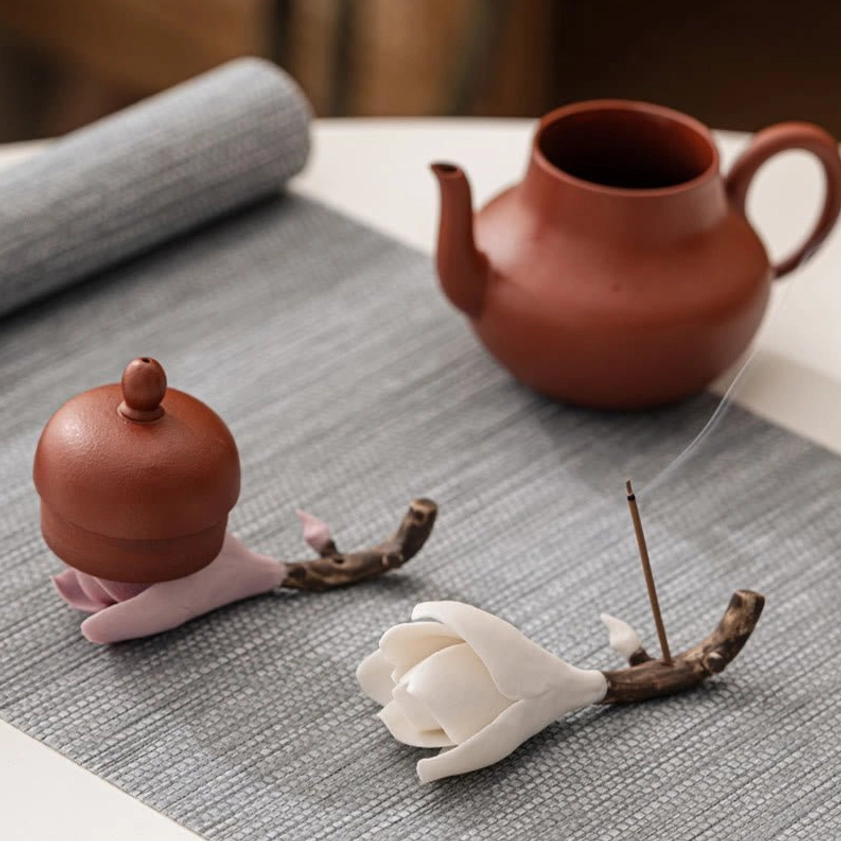 Ceramic magnolia Buddhist incense burner in white color option for yoga studio and meditation room ambiance