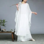 White chiffon Zen meditation yoga outfit front full view with oversized bat sleeves and layered hem for spiritual practice