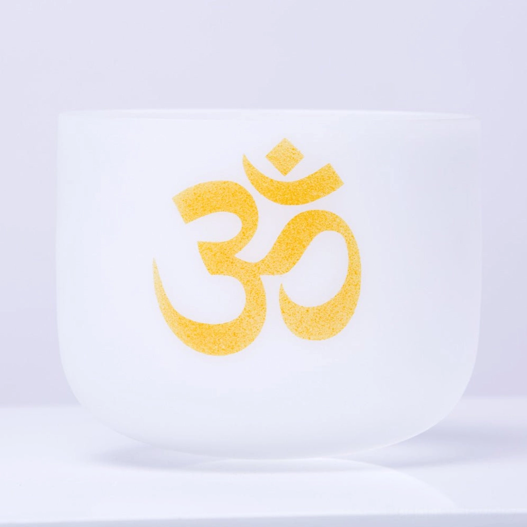 White Crystal OM Singing Bowl - Front View with Golden Om Symbol Engraving