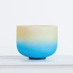 White crystal singing bowl front view with gradient frosted finish and black rubber base for meditation and chakra healing