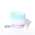 Handcrafted white crystal ombre singing bowl with blue-pink frosted finish, black rubber base, wooden mallet, and rubber ring displayed on white background