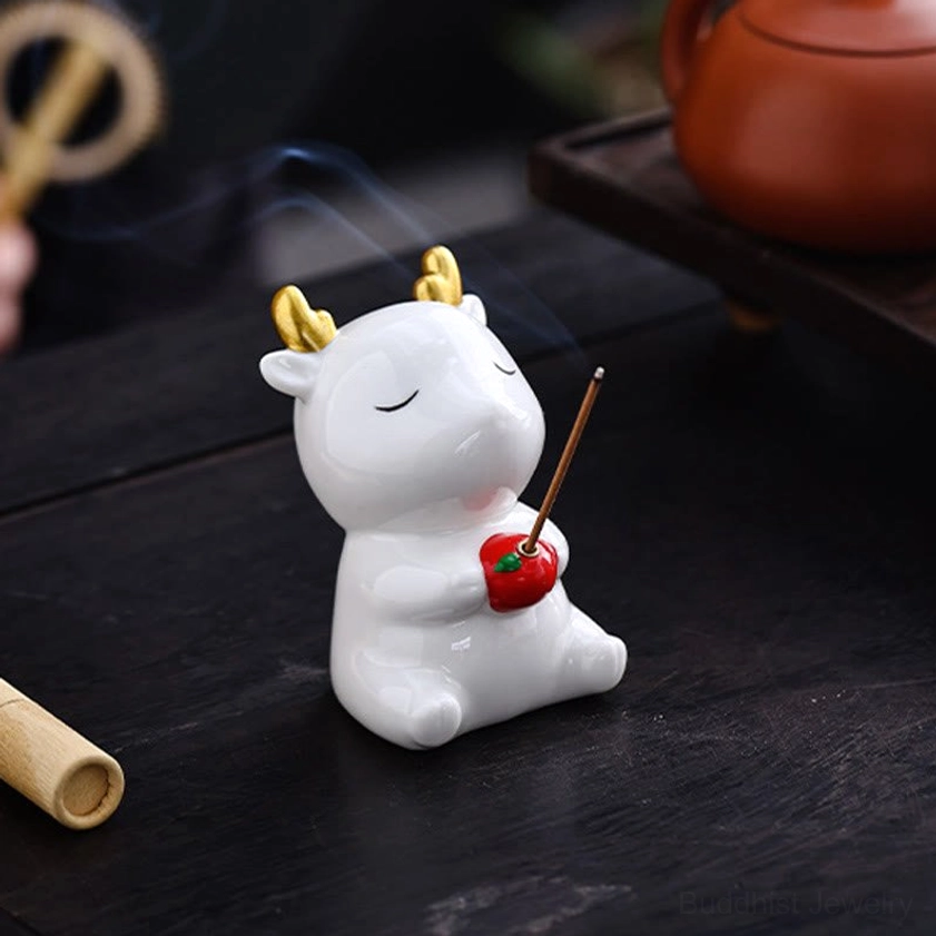 Handcrafted White Deer Incense Burner with Burning Incense on Wooden Tea Table - Spiritual Décor