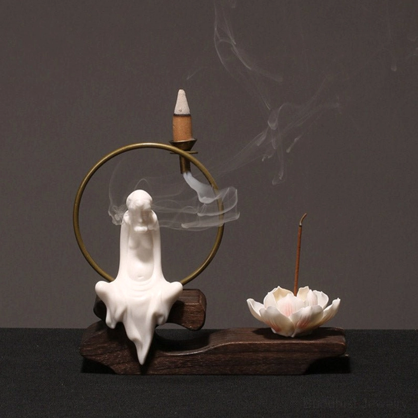 White ceramic incense burner with Buddhist Dharma figurine, handmade lotus holder for meditation and spiritual practice