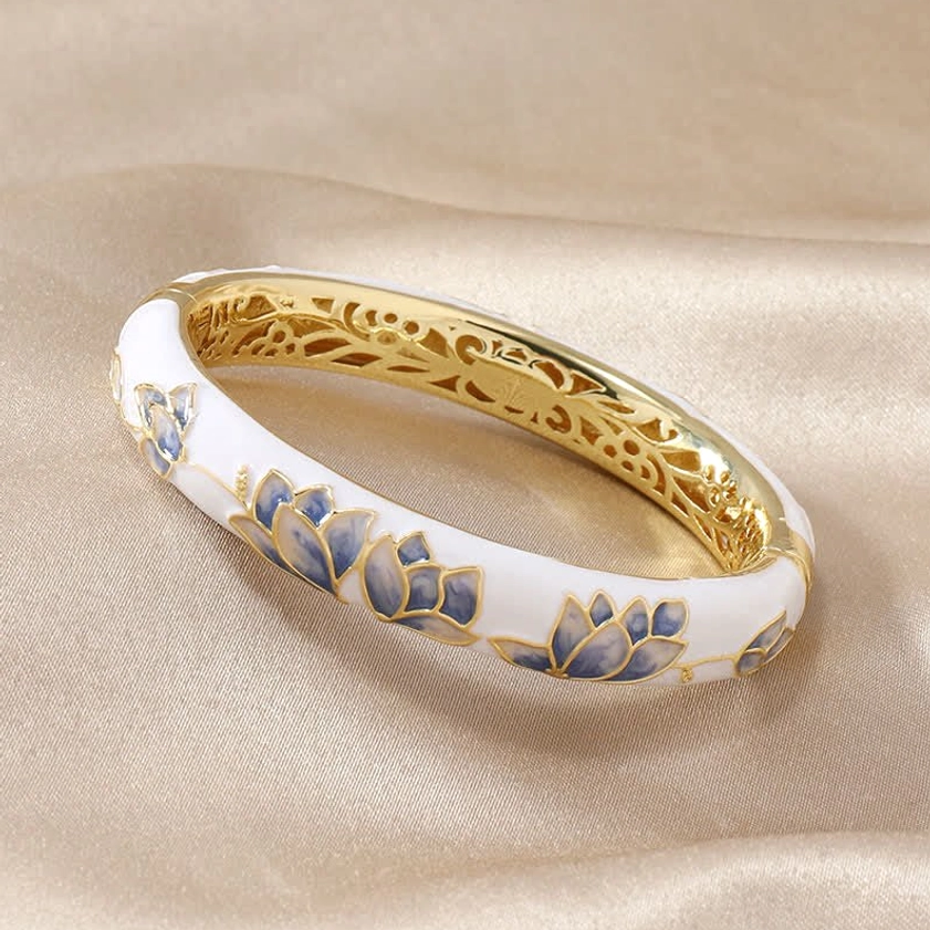 White enamel lotus bangle bracelet with blue lotus designs and gold hollow carved inner frame, Buddhist spiritual jewelry