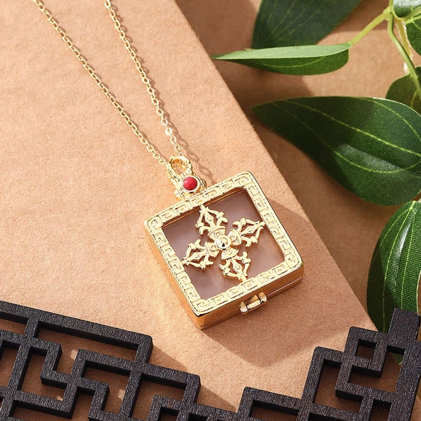 White jade double dorje buddhist necklace product showcase with spiritual protection and enlightenment symbolism