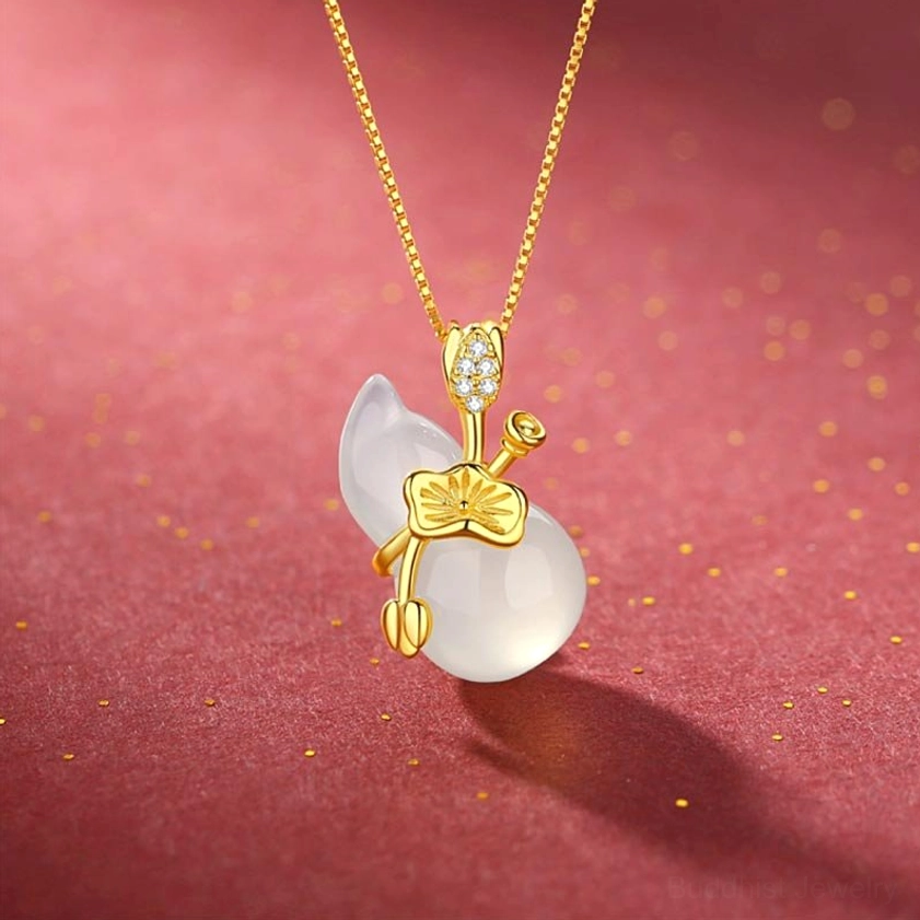 White jade gourd pendant necklace front view with gold chain, lotus leaf metal decoration and diamond accents