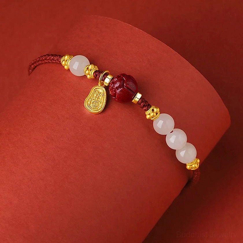 Hetian white jade lotus bracelet side view showing bead arrangement and gold charm detail