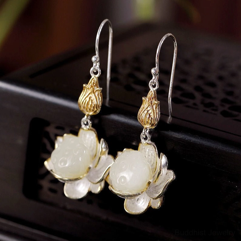 White jade lotus drop earrings for Buddhist meditation and spiritual practice elegant jewelry showcase