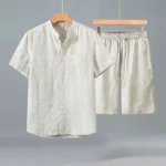Men's white linen meditation two-piece set front view - Buddhist-inspired button-up shirt with mandarin collar and straight shorts