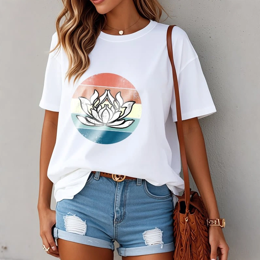 Woman wearing white Buddhist lotus t-shirt with vintage sunset design casual daily styling