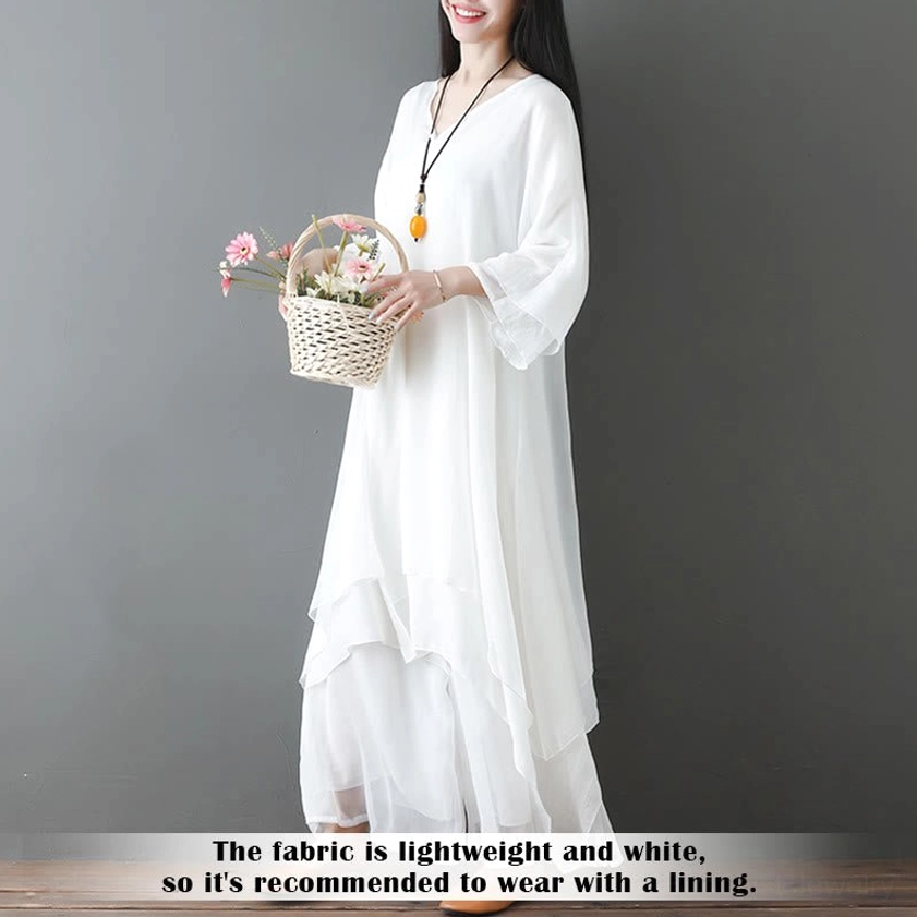 White Zen casual meditation outfit left side front view showing long maxi length and bell sleeves for tai chi practice